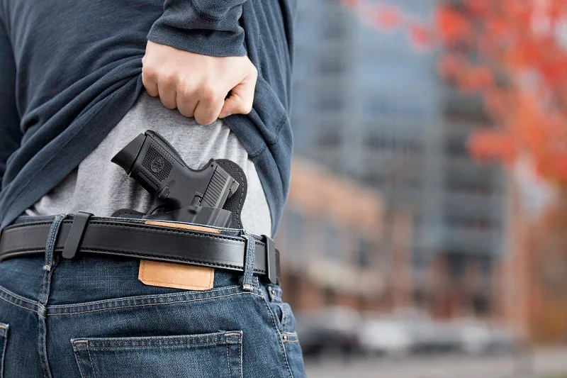 Capa do artigo A ausência de ofensividade no porte de arma por seu possuidor